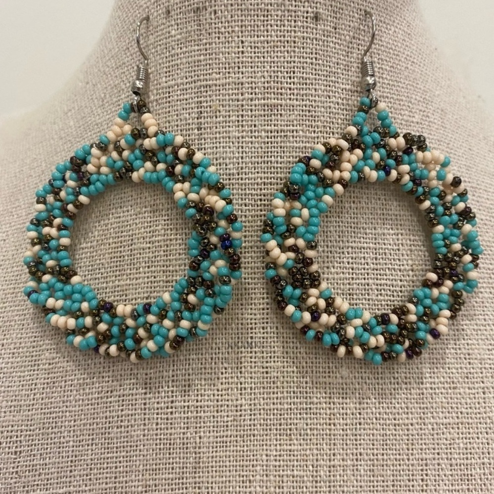 Handmade chakira bead earrings. Handmade by artisans in Mexico 1.5" diameter
